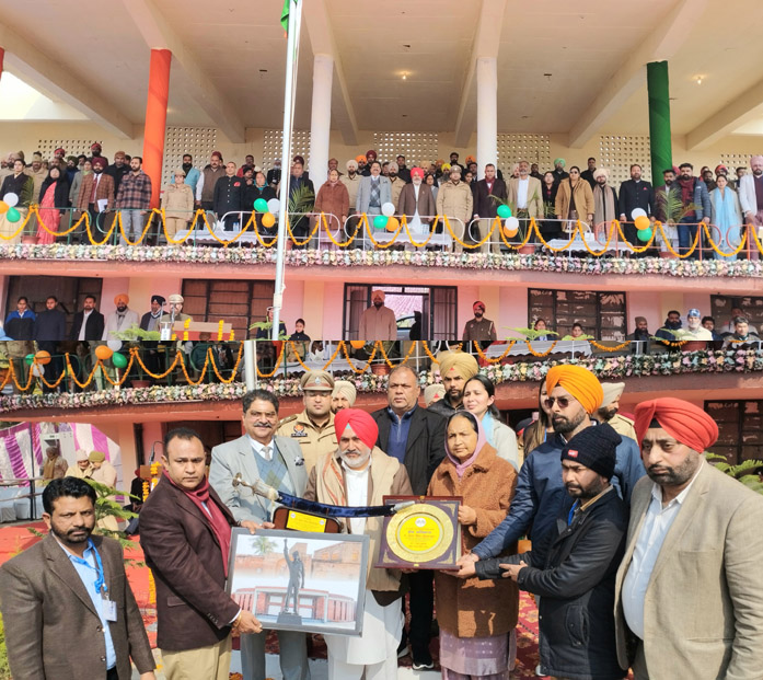 Cabinet Minister Jauda Majra hoisted the national flag at the district level Republic Day event